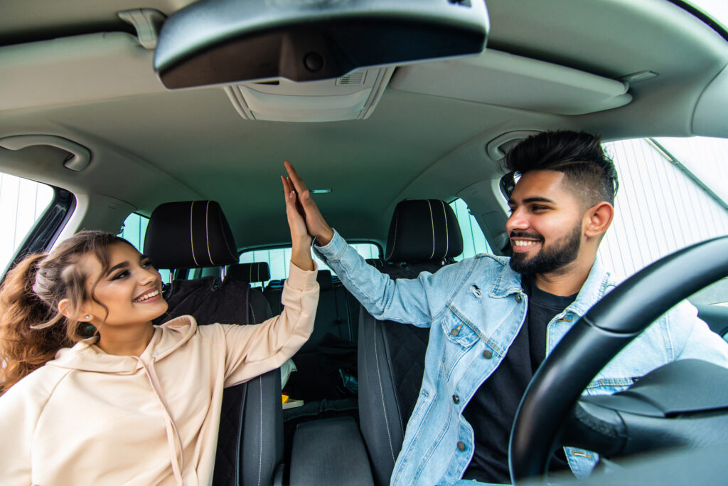 Young Couple High Five